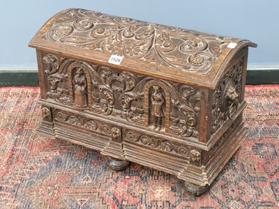Lot 1526 - A 19th century oak coffer carved in the...