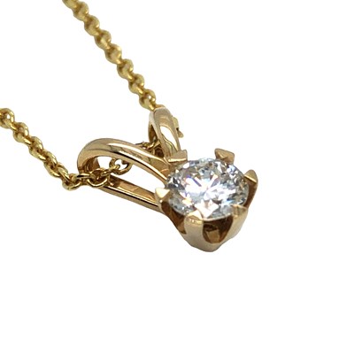 Lot 1040 - A hallmarked 14ct yellow gold round-cut...