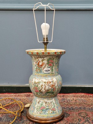 Lot 1529 - A Canton turquoise ground gu shaped vase as a...