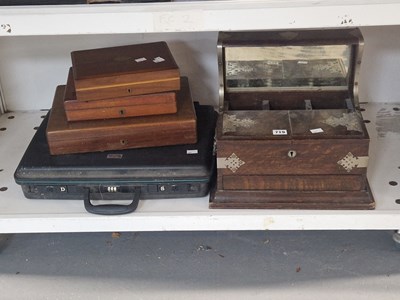 Lot 719 - A tantalus case, four mahogany cutlery cases...