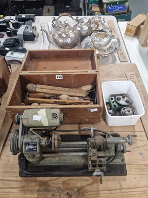 Lot 739 - A table top electric lathe, some accessories...