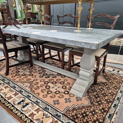 Lot 10 - A good quality zinc-topped dining table on...