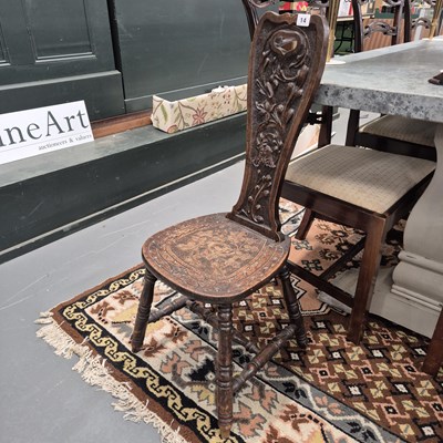 Lot 14 - A carved oak spinner's chair