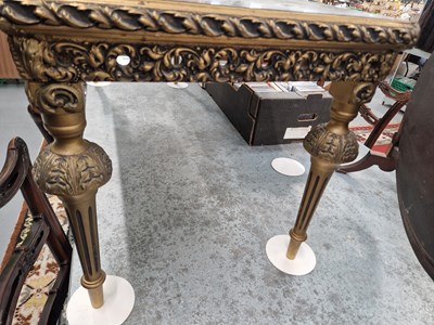 Lot 15 - A gilt decorated coffee table. H 47 W 123 D 48cm