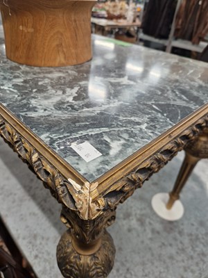 Lot 15 - A gilt decorated coffee table. H 47 W 123 D 48cm