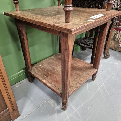 Lot 27 - An art deco teak two-tier table. H 63 W 56 D 57cm