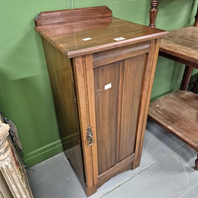 Lot 30 - A mahogany bedside cabinet. H 82 W 37 D 34cm