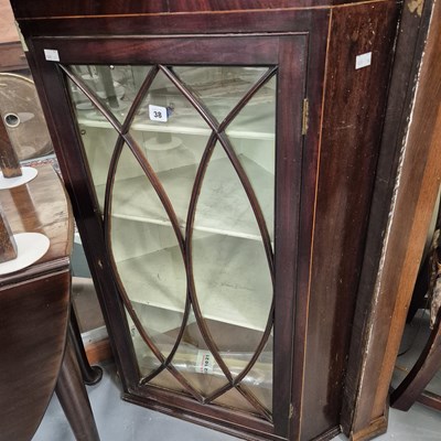Lot 38 - A mahogany glazed corner cabinet. H 109 W 72 D...