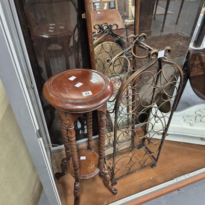 Lot 42 - A plant stand, a wine rack and a mirror.