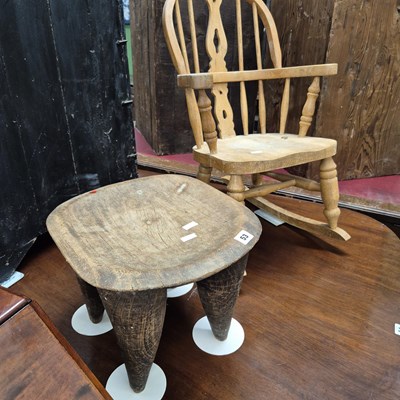 Lot 53 - A carved African stool and a child's chair