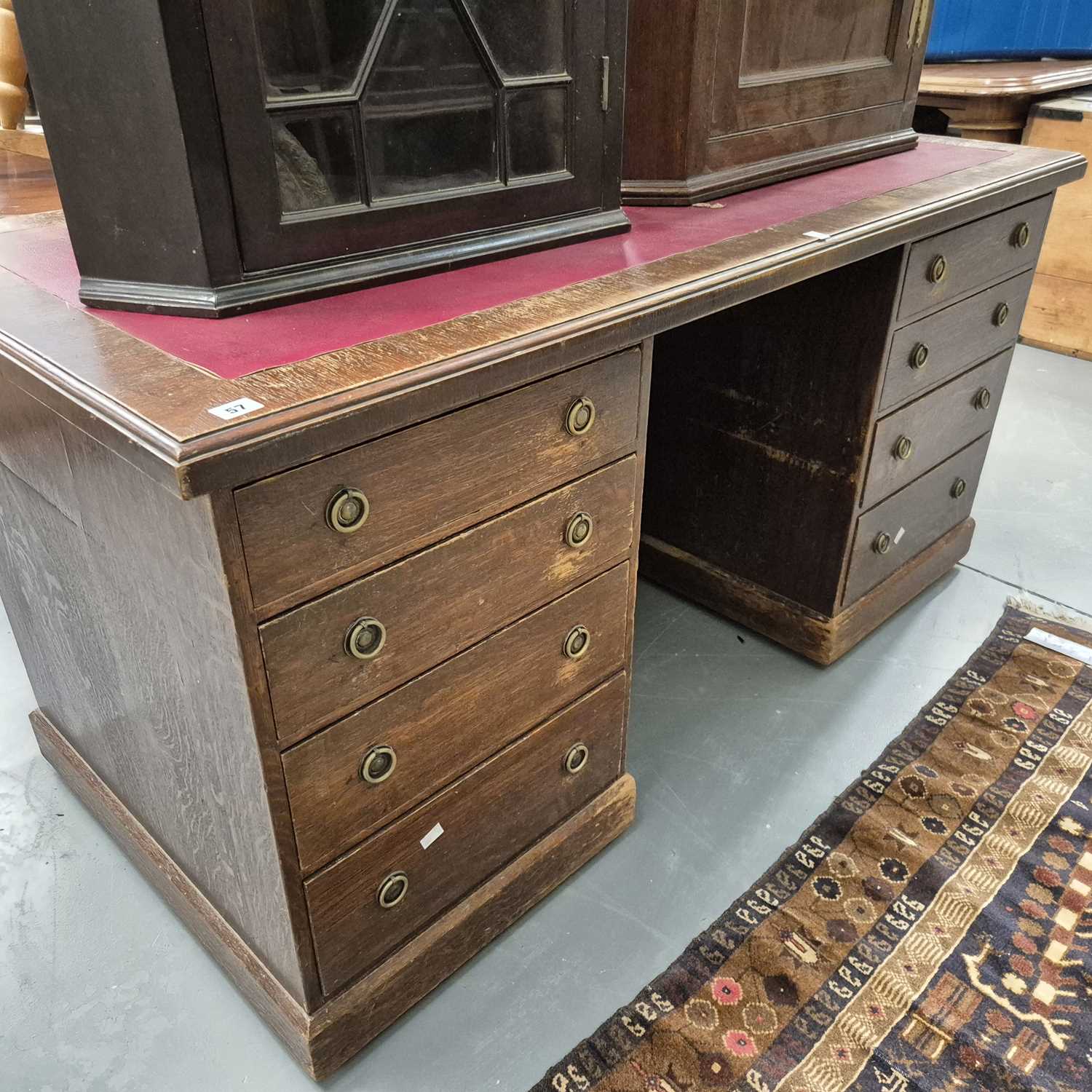 Lot 57 - A twin pedestal desk. H 76 W 153 D 71cm.