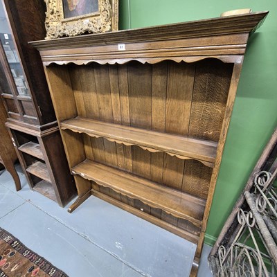 Lot 61 - An oak dresser rack. H 119 W 106 D 20cm.
