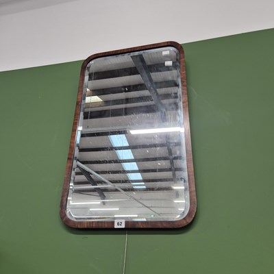 Lot 62 - A mahogany-framed wall mirror. 72x43cm.