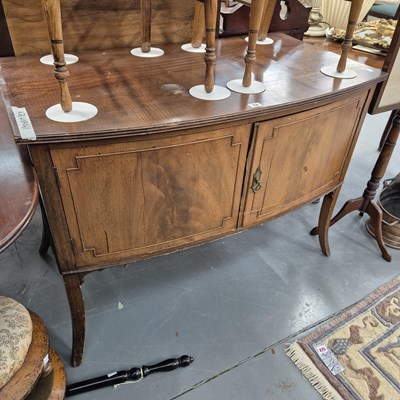 Lot 72 - A bow front side cabinet. H 78 W 107 D 61cm.