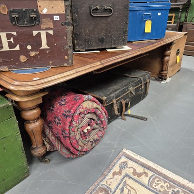 Lot 78 - A large Victorian mahogany dining table. H 73...