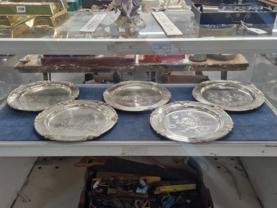 Lot 762 - Five various electroplate armorial dishes