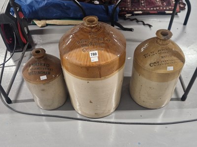Lot 780 - Three named two tone stoneware flasks