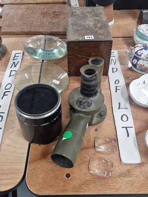 Lot 784 - Four magnifying lenses, three others mounted...