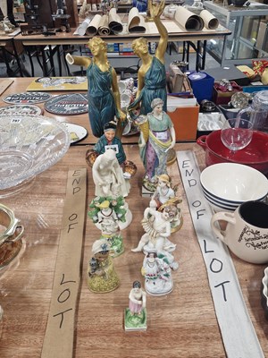 Lot 798 - A collection of pottery and porcelain figures:...
