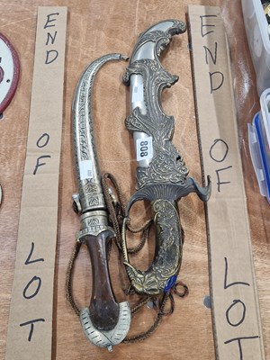 Lot 808 - Two Arabian daggers and sheaths