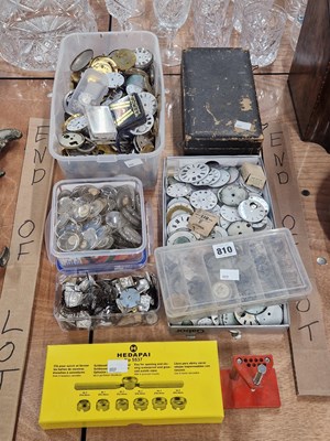 Lot 810 - A collection of pocket watch faces, movements,...