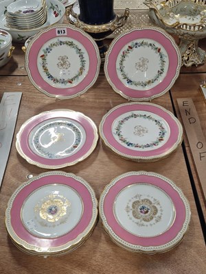 Lot 813 - A collection of Limoges pink bordered floral...