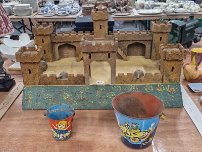 Lot 817 - A wooden castle mounted with four iron cannon,...