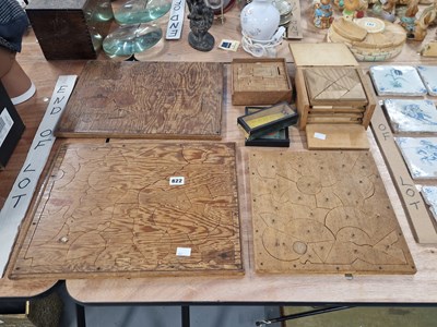 Lot 822 - A collection of wooden jigsaw puzzles together...