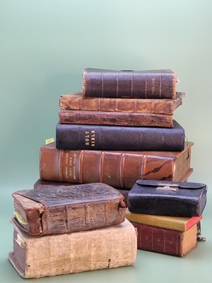 Lot 1548 - A collection of twelve bibles and common...