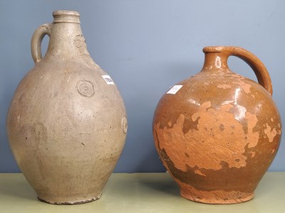 Lot 1554 - A grey stoneware bellarmine with three...