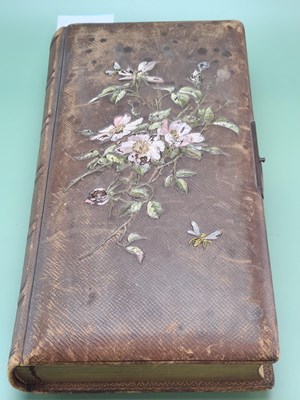 Lot 1563 - A leather bound album of family photographic...