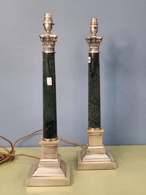 Lot 1570 - A pair of column table lamps, the metal...