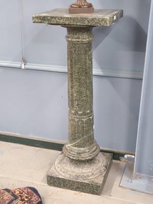 Lot 1573 - A mottled green stone column, the rectangular...