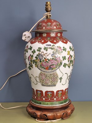 Lot 1589 - A Chinoiserie porcelain baluster jar, cover...