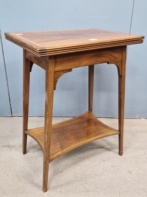 Lot 1595 - An Edwardian satin wood banded mahogany swivel...