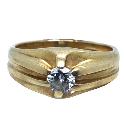 Lot 1003 - An 18ct hallmarked gold and diamond single...