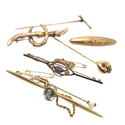 Lot 1020 - A group of gold brooches and stick pins,...