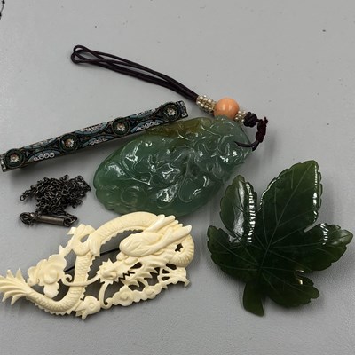 Lot 1025 - A Nephrite jade carved leaf brooch by B.C....