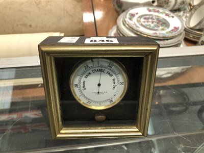 Lot 846 - A framed pocket watch form barometer