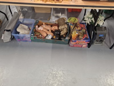 Lot 854 - A doll, soft toys, board games, three lawn...