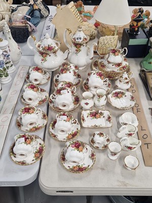 Lot 870 - A collection of Royal Albert old rose pattern...