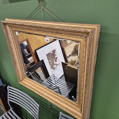 Lot 108 - An antique gilt framed mirror. 74 x 64cm.