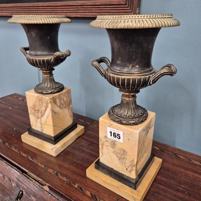 Lot 165 - A pair of grand tour type bronze urns with...