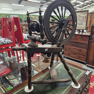 Lot 198 - An antique spinning wheel