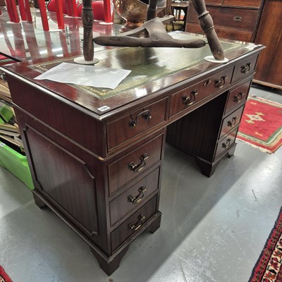 Lot 199 - A small twin pedestal writing desk. H 76 W 122...