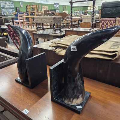 Lot 205 - A pair of large horn bookends.