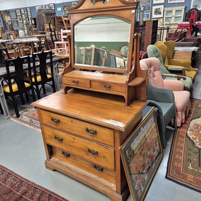 Lot 212 - A walnut dressing chest. H 172 W 97 D 53cm.