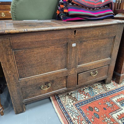 Lot 218 - An early 18th century oak mule chest. H 72 W...