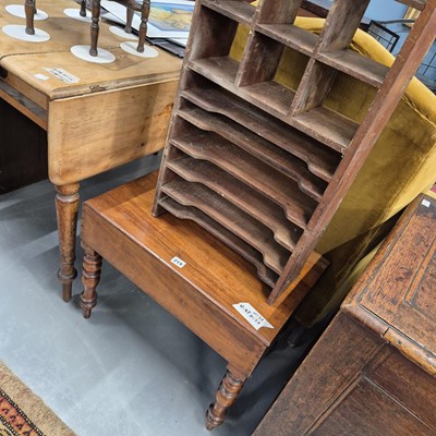 Lot 219 - A 19th-century bidet and a filing rack. Bidet...