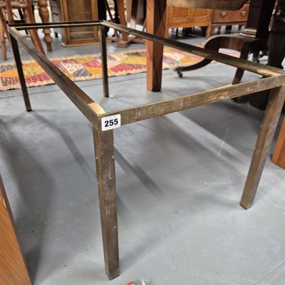 Lot 255 - A brass framed coffee table base.